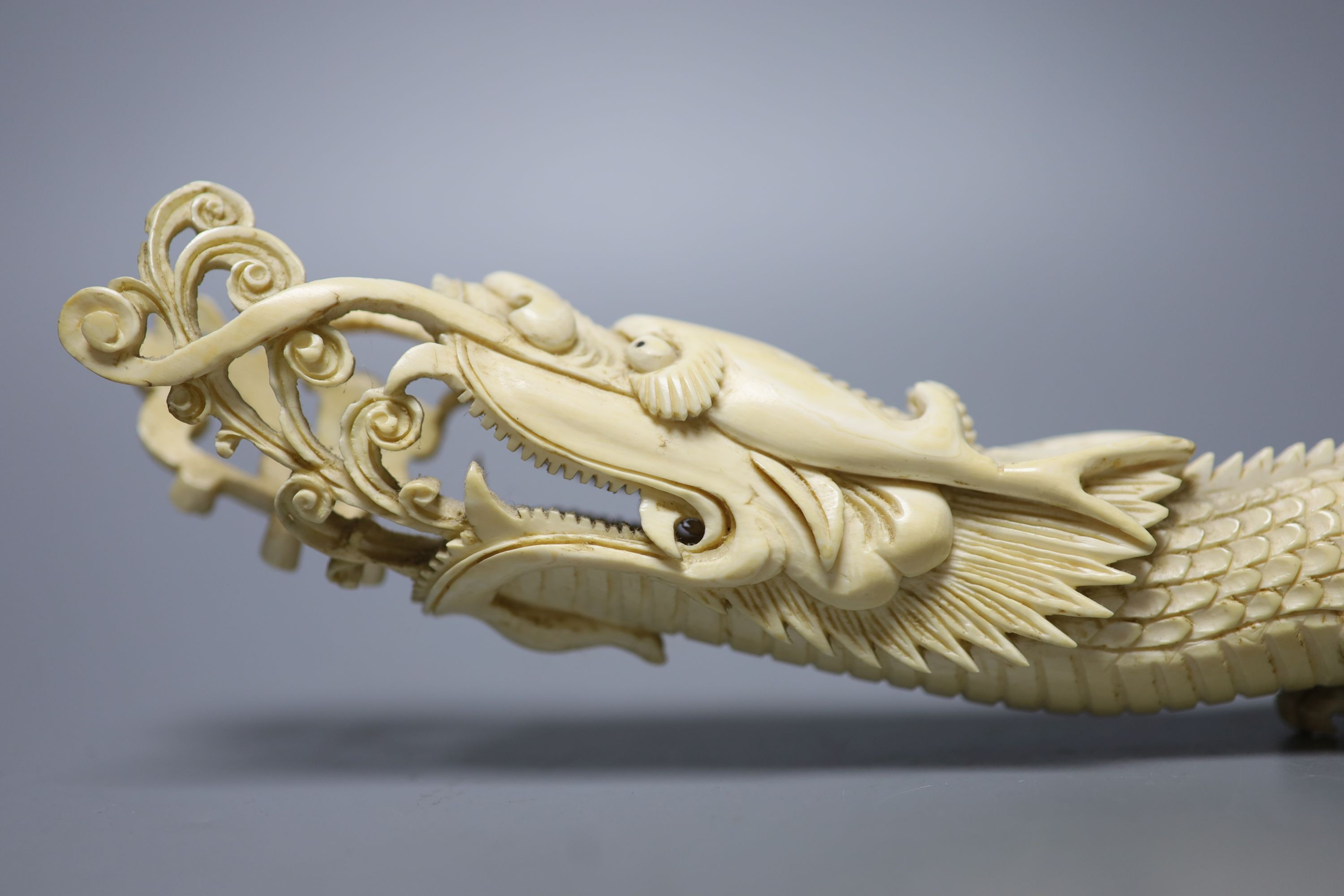 An Indonesian ivory carving of a dragon, first half of 20th century 52cm, , An Indonesian ivory carving of a dragon, first half of 20th century